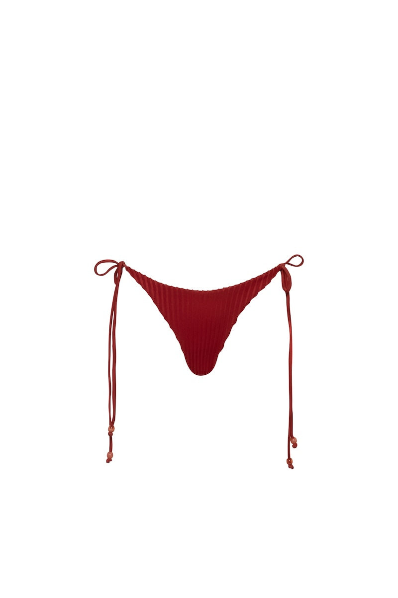 Baobab Roma bikini bottom in vibrant fabric, featuring a stylish cut and seamless design for a comfortable fit.