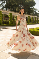 Estefania Rosetta Maxi Dress in flowing fabric with a stylish neckline and floral pattern, perfect for summer or casual wear.