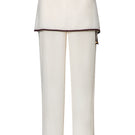 Baobab Renata pants in cappuccino, stylish women's casual pants with a relaxed fit and soft fabric, shown on a model.
