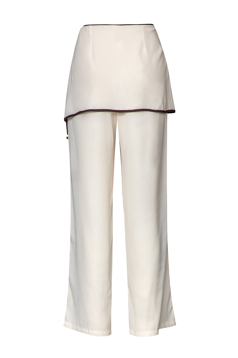 Baobab Renata pants in cappuccino color, stylish casual pants made from soft fabric, displayed on a hanger.