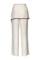 Baobab Renata pants in cappuccino color, stylish casual pants made from soft fabric, displayed on a hanger.
