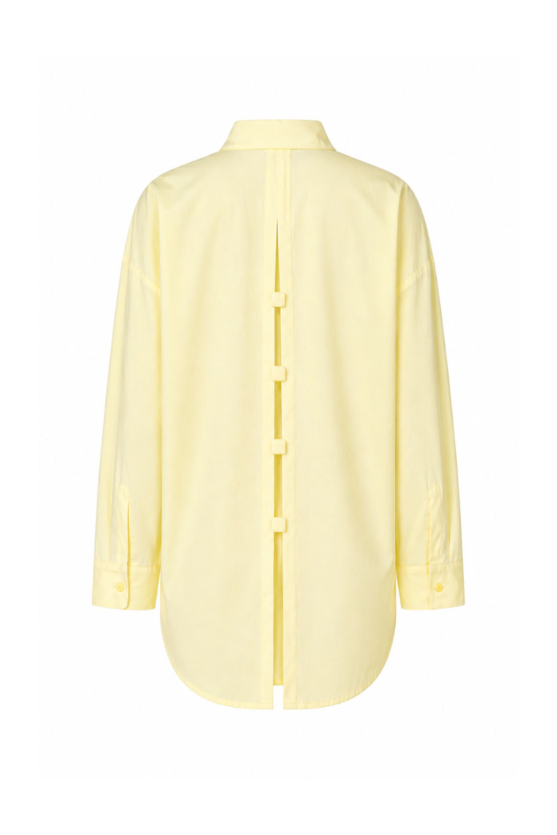 Baobab Wayra shirt in Limone color, featuring a lightweight, stylish design with a relaxed fit and button details.