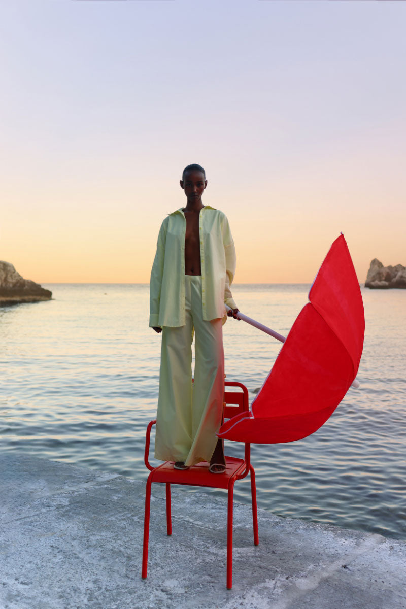 Baobab Wayra shirt in limone color, featuring a lightweight, casual design with button front and short sleeves.