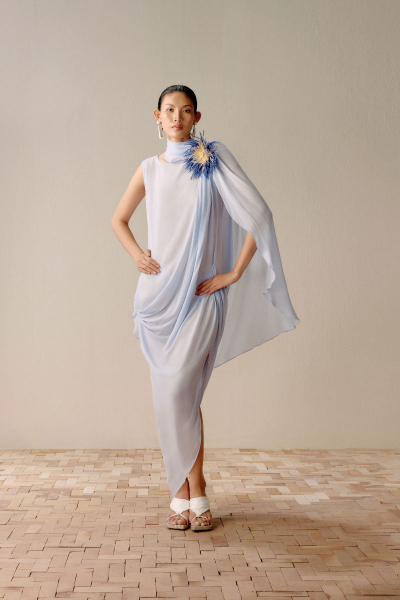 Sky blue flowy dream dress by Lecia, midi length with soft fabric and elegant drape, perfect for casual or semi-formal occasions.