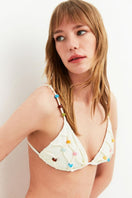Maliluha ivory sunset bird bikini set with floral print, featuring triangle top and matching bottoms on a white background.