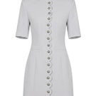 White buttoned mini dress by Keira Tong featuring a fitted silhouette and short sleeves, perfect for casual or dressy occasions.