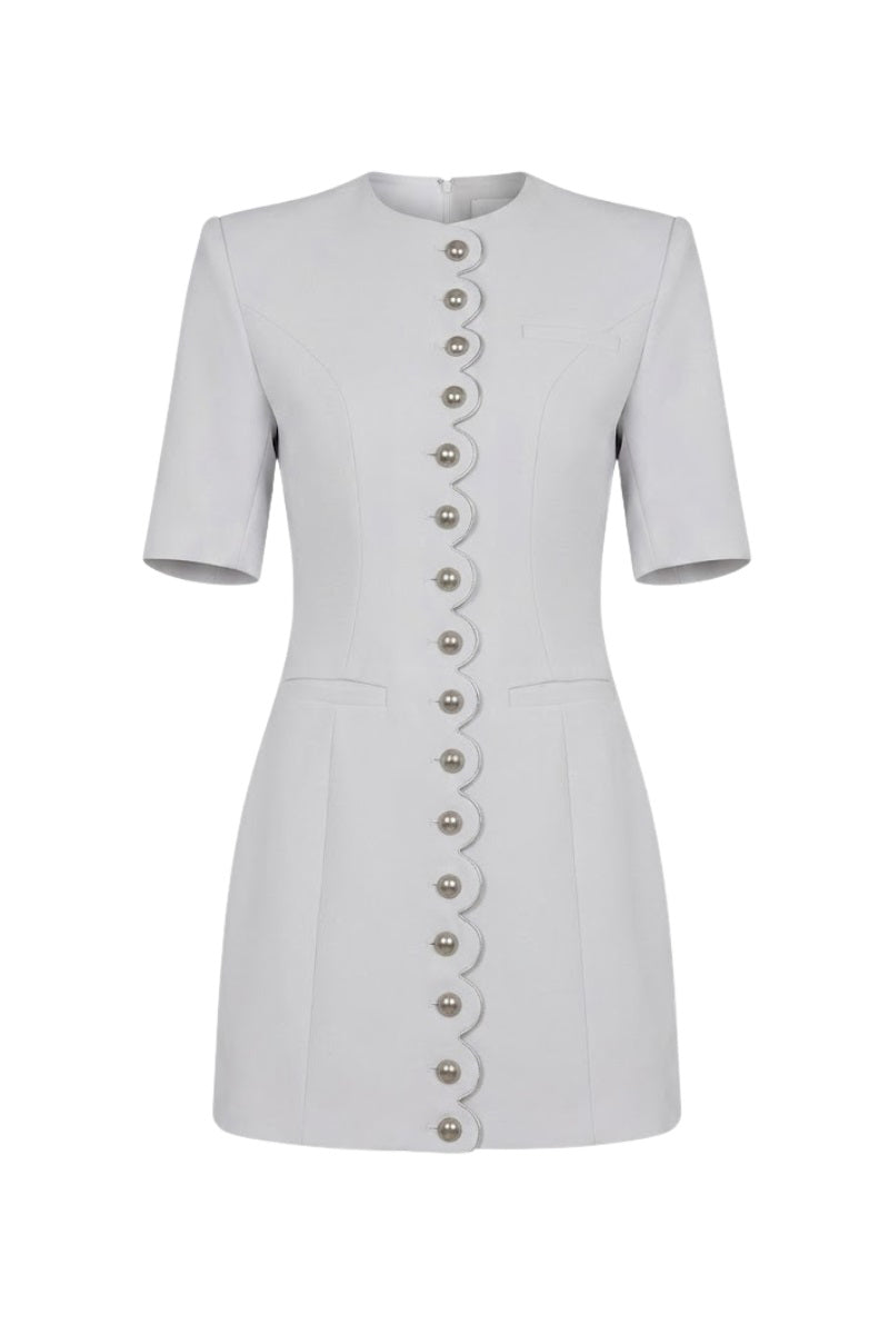 White buttoned mini dress by Keira Tong, featuring a fitted silhouette and stylish button details, perfect for casual or dressy occasions.