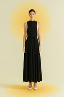 Black Peper Rib Knit Maxi Dress by EEGEN STUDIO, featuring a fitted ribbed knit design and a stylish, elegant silhouette.