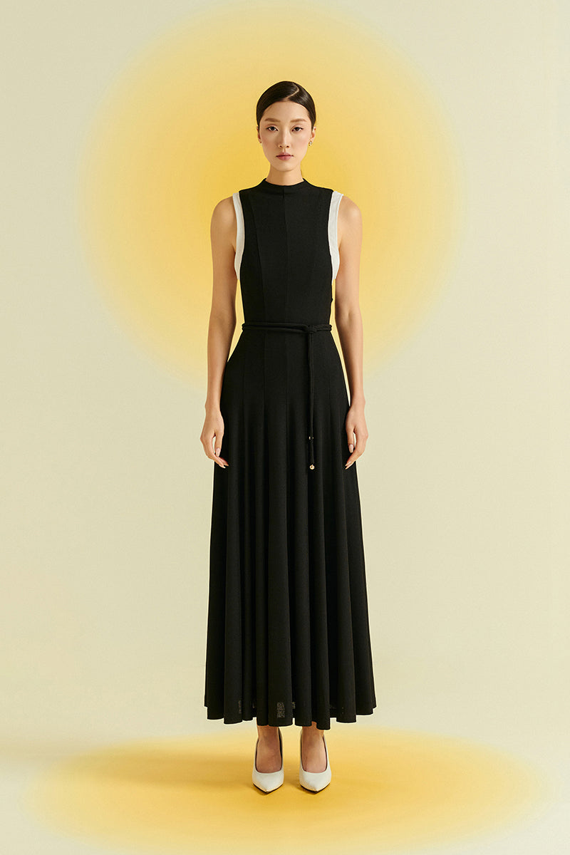 Black Peper Rib Knit Maxi Dress by EEGEN STUDIO, featuring a fitted ribbed knit design and a stylish, elegant silhouette.