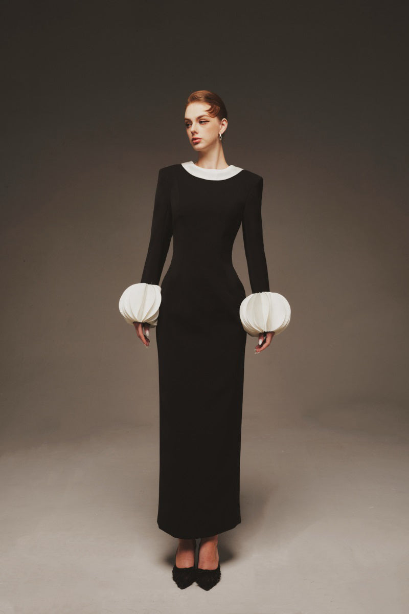 Margée Atelier Aurora Cuffs maxi dress featuring flowing fabric, elegant design, and cuff details in a full-length view.
