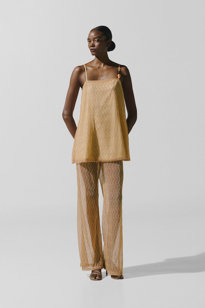 Baobab Porto Top in Festa fabric, featuring a stylish sleeveless design with vibrant patterns and a relaxed fit.