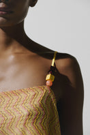 Baobab Porto Top in Festa, stylish women’s top with vibrant fabric and modern design, shown on a model.