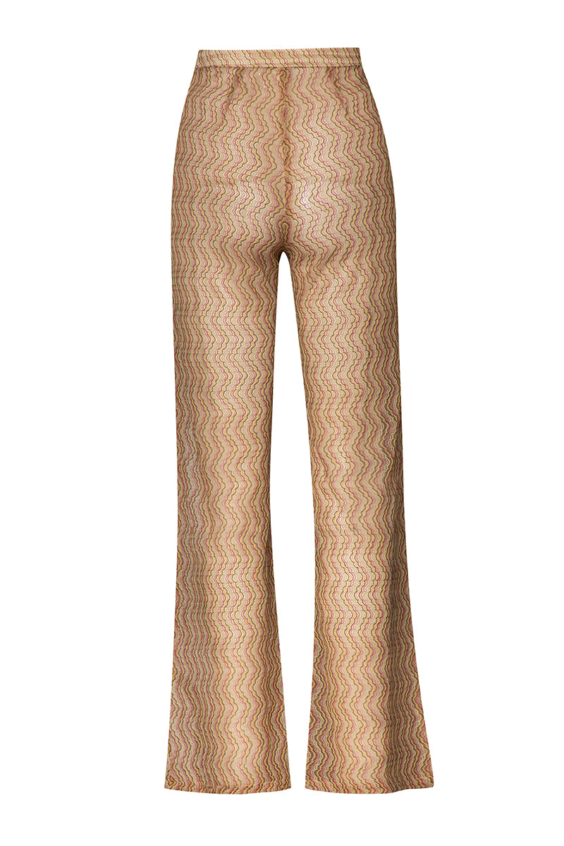 Baobab Porto Festa pants in vibrant fabric, showcased on a model, highlighting stylish design and comfortable fit.