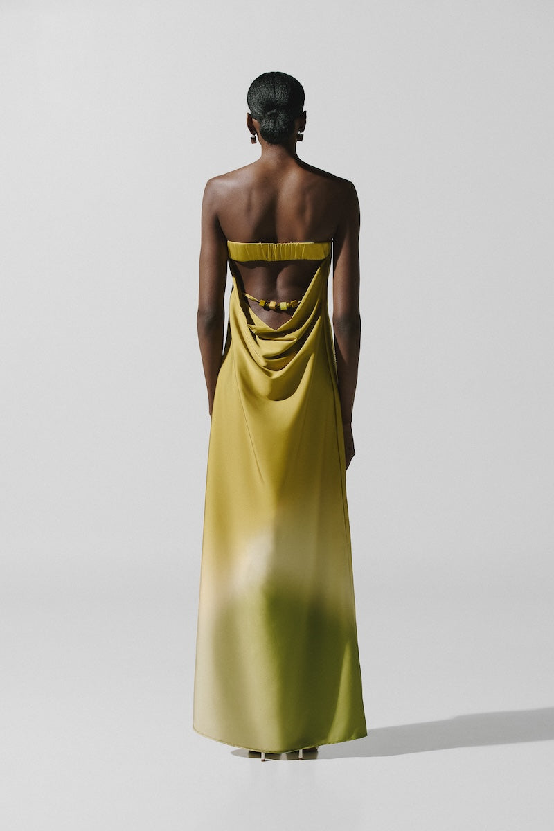 Baobab Lola maxi dress in Tramonto Verde featuring flowing fabric and elegant design, perfect for summer wear.