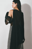 Black asymmetric see-through cape jacket by Lecia, featuring sheer fabric and stylish drape, perfect for layered fashion looks.