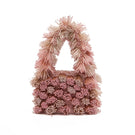 Onalaja ZAZA blush top handle bag with sleek design and minimalist style, featuring a smooth finish and elegant handles.