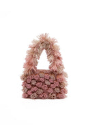 Onalaja ZAZA blush top handle bag with sleek design and minimalist style, featuring a smooth finish and elegant handles.