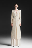 Maison Des Copains ivory cream V-neck trench coat with classic design, shown on a model with belt and double-breasted style.