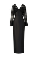 Elegant Tracy gown by Arti Apparel featuring flowing fabric and intricate design, showcased in a full-length view.