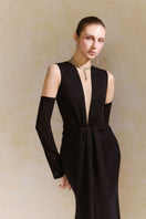 Elegant AIA dress gown by Arti Apparel, featuring intricate design and flowing fabric for formal occasions.