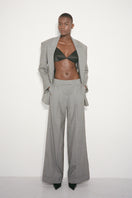 Nué Poppy Bullet Bra featuring smooth fabric, underwire support, and adjustable straps, displayed on a mannequin.