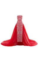 Le Thanh Hoa Imperial Peony gown featuring intricate floral embroidery and flowing fabric in a luxurious design.