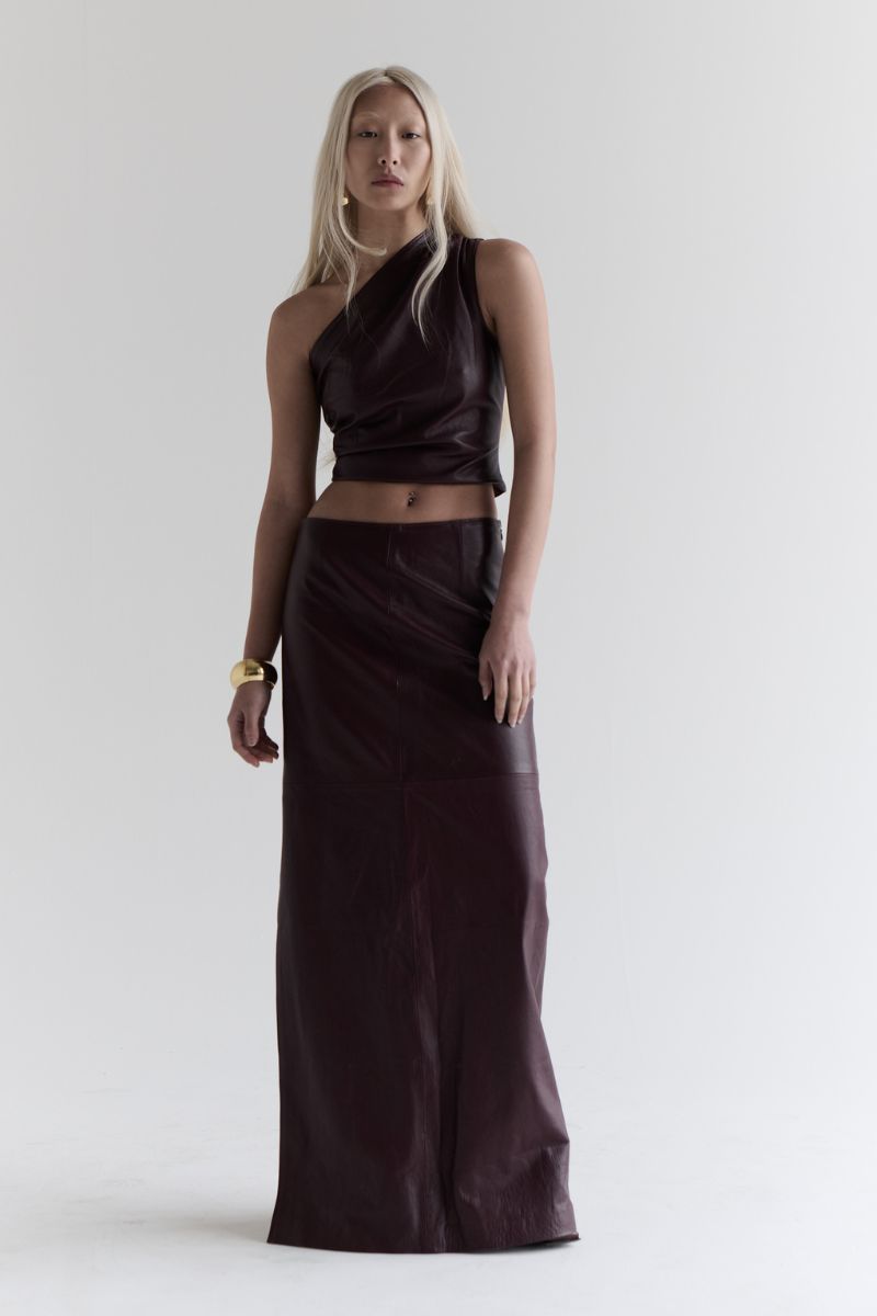 ZUT Laurel leather top featuring fitted design, smooth leather texture, and stylish neckline, perfect for chic casual wear.