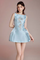 Blue Aurora mini dress by Do Long, showcasing a stylish short dress with a fitted silhouette and vibrant color.