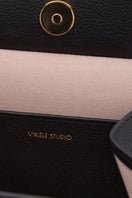 Black CELINE mini top handle bag by VIKELE STUDIO, featuring a sleek design and compact structure for elegant carrying.