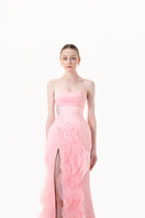 Blush pink strapless ruffle slit gown by Happy Clothing, featuring a flowing design and elegant ruffle details.