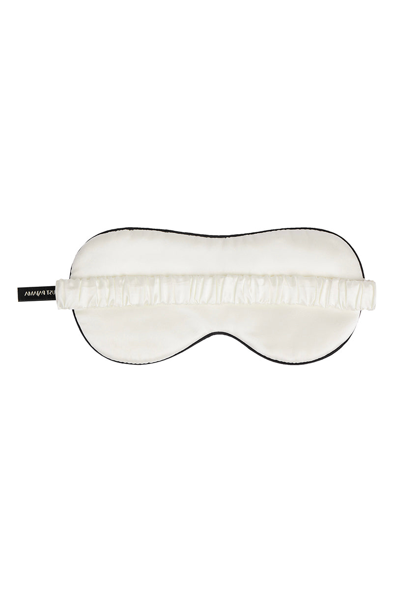 White Little Heart Eye Mask by Not Just Pajama, soft loungewear accessory with heart-shaped eye cutouts for relaxation and sleep.