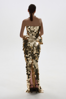 Gold sequin maxi skirt by BALYKINA, featuring a flowing design and shimmering embellishments, perfect for stylish occasions.
