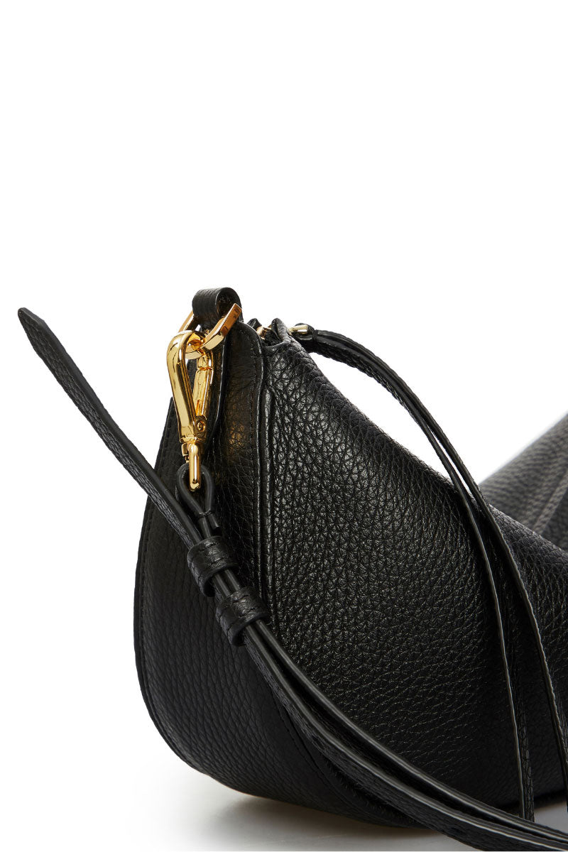 Black Denise mini shoulder bag by Vikele Studio with a sleek, compact design and adjustable strap.