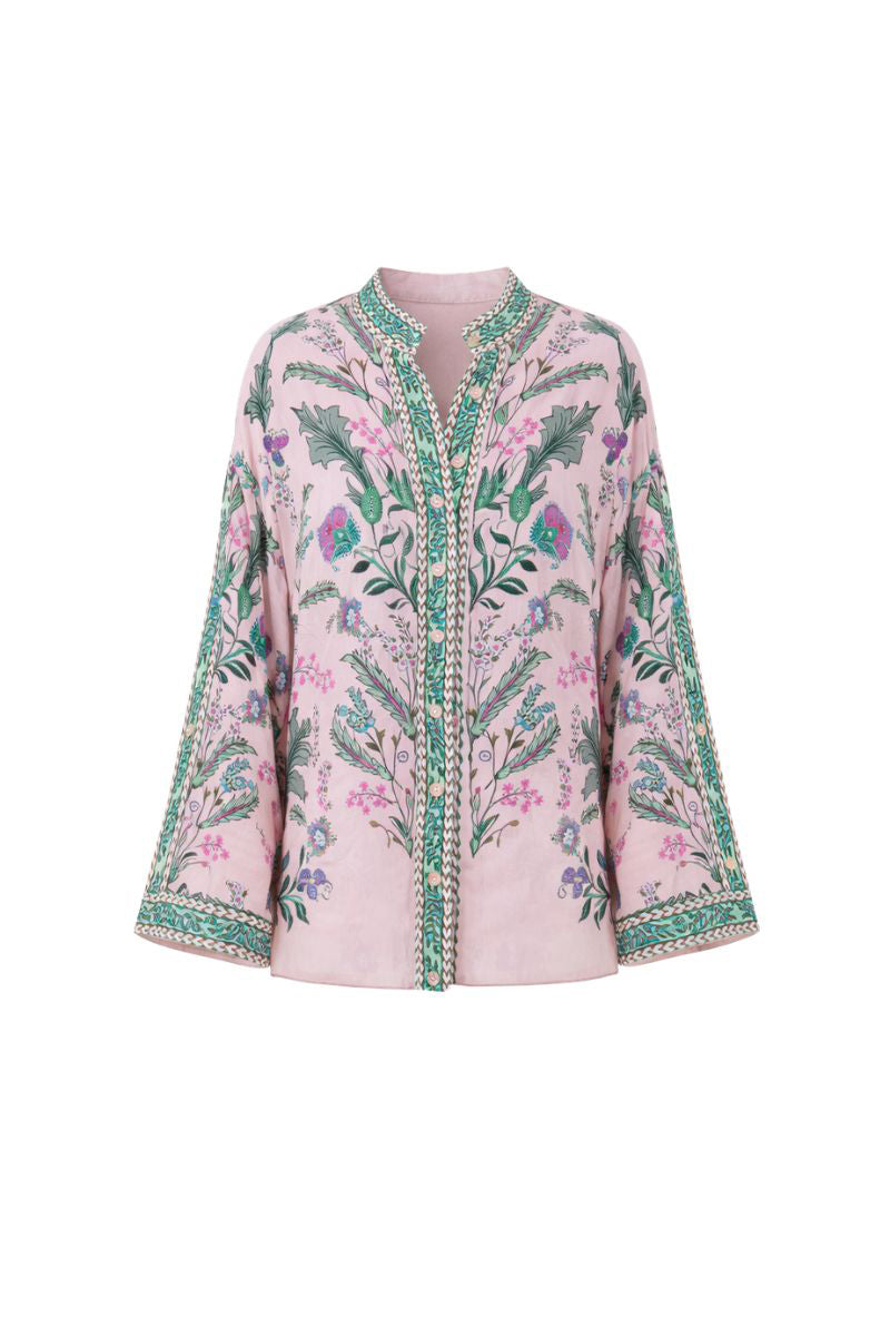 Raishma Ariyah shirt, stylish women's shirt with a modern design, displayed on a hanger against a neutral background.