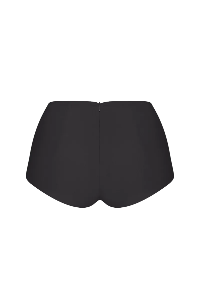 Black matte silk pants by Balykina featuring a sleek, smooth fabric and tailored fit on a neutral background.