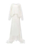Arti Apparel Solara Maxi Dress in flowing fabric with a fitted waist and elegant design, perfect for summer wear.