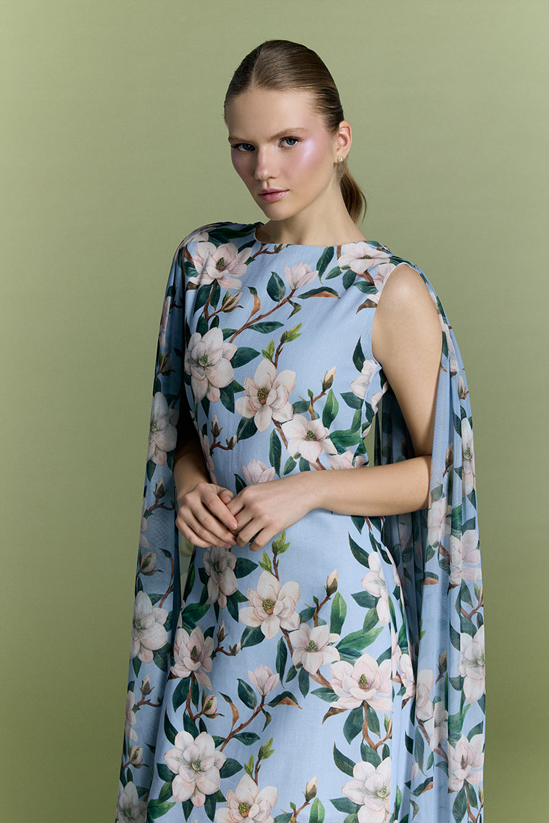 Nur Karaata Whisper Wind gown featuring flowing fabric and elegant design, perfect for formal or evening wear.