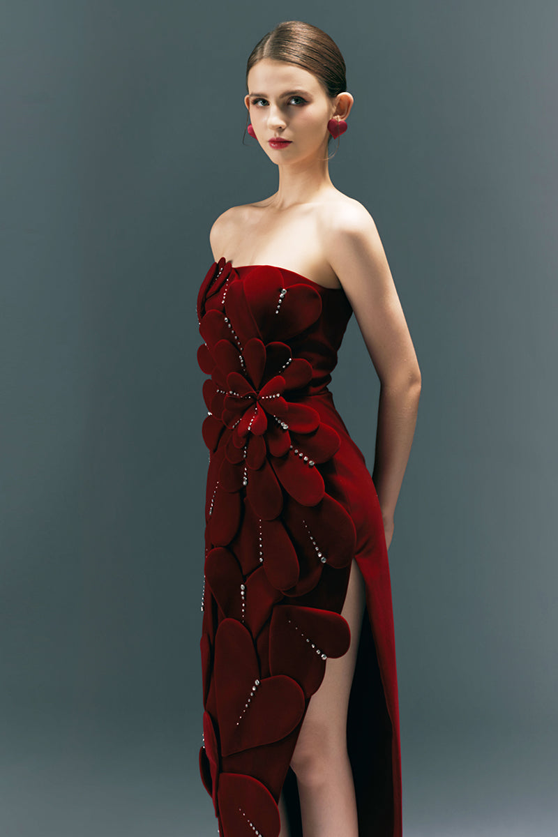 HAPPY CLOTHING CULT MIA X strapless burgundy velvet gown with a fitted silhouette and elegant design.