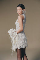 Keira Tong Belle Jardin mini dress featuring floral print, sleeveless design, and fitted silhouette.
