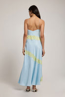 Summer Away ARAVA Maxi Dress featuring a flowy design with a fitted waist and breezy fabric, perfect for summer occasions.