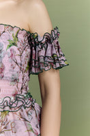 Nur Karaata Tropic Allure co-ord set featuring a matching top and pants with tropical print fabric.