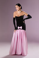 Nur Karaata Marcelline gown featuring elegant fabric and intricate design, showcased on a model.