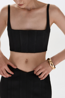 Black matte silk top with shoulder straps by BALYKINA, featuring a smooth, elegant fabric and stylish design.