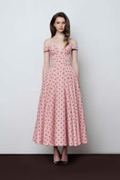 Do Long Urban Bloom midi dress featuring a floral pattern and flowy fabric, perfect for casual or semi-formal occasions.