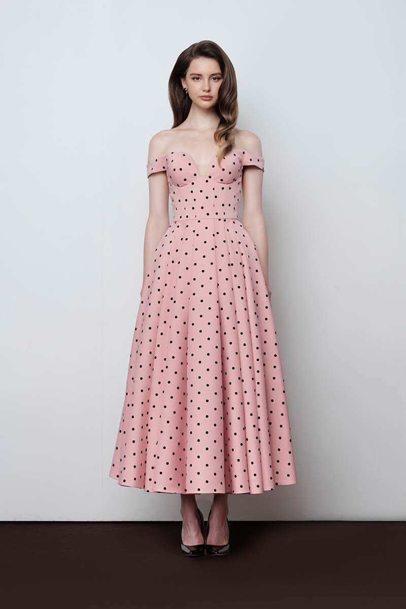 Do Long Urban Bloom midi dress featuring a floral pattern and flowy fabric, perfect for casual or semi-formal occasions.