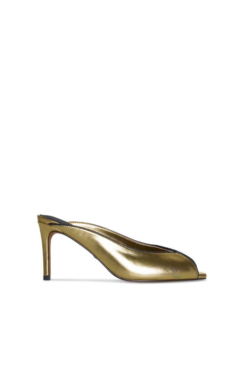 Gold RIVA HEEL in 10TH FLOOR heels, featuring a sleek design and high heel style, shown on a neutral background.
