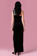 Nur Karaata Midnight Muse gown featuring elegant black fabric, fitted bodice, and flowing skirt for formal occasions.