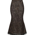 Black Nana Jacqueline Evelina midi skirt shown on a model, featuring a sleek, fitted design and elegant length.