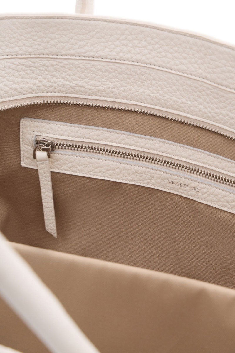 Off-white canvas tote bag by VIKELE STUDIO, shoulder bag with sturdy handles and minimalist design, perfect for everyday use.