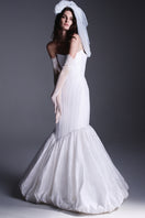 Elegant scarlet BALYKINA gown with flowing fabric and intricate details, perfect for formal occasions and evening wear.